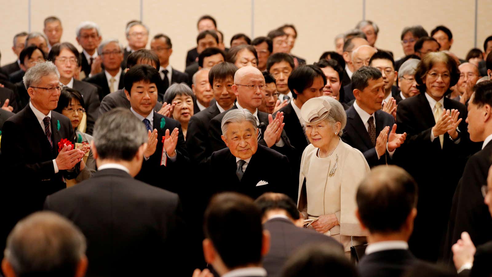 Japan’s Emperor Akihito and Empress Michiko are greeted as they attend a reception for the Midori Academic Prize award ceremony in Tokyo on April 26.