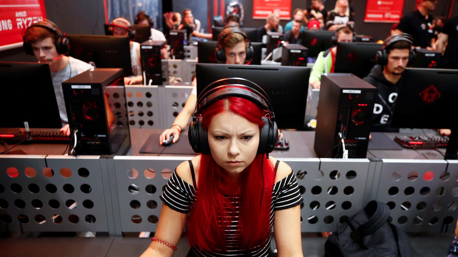 Gamers focus during a gaming competition.