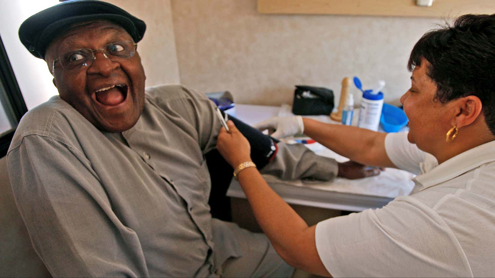 Archbishop Desmond Tutu helps to raise awareness about diabetes and other diseases inside a Tutu Tester mobile unit