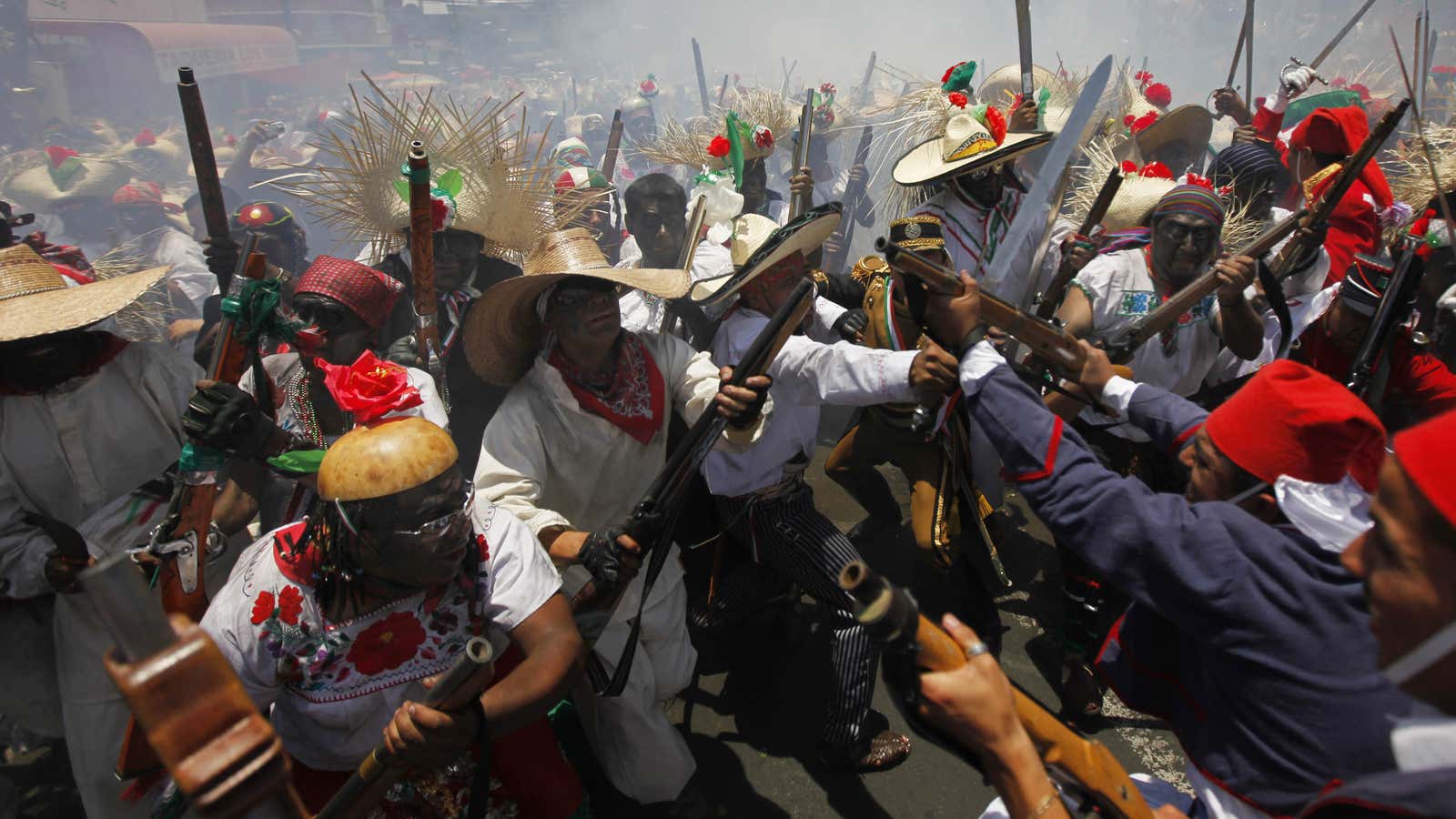 Revelers reenact the Battle of Puebla in Mexico City.