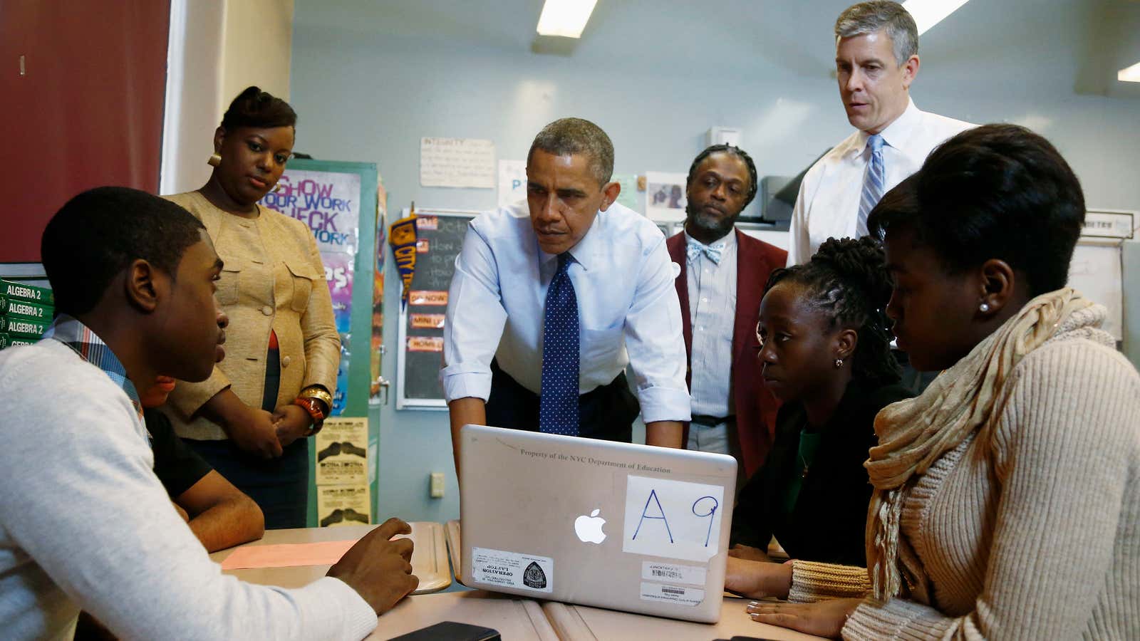 President Barack Obama, accompanied by Education Secretary Arne Duncan, right, visits a math classroom at Pathways in Technology Early College High School (P-TECH) in Brooklyn…