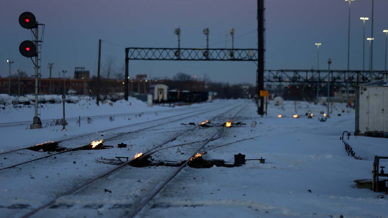 Gas-fired switch heater on the rails keeps the ice and snow off the switches near a train station in Chicago on Jan. 29.