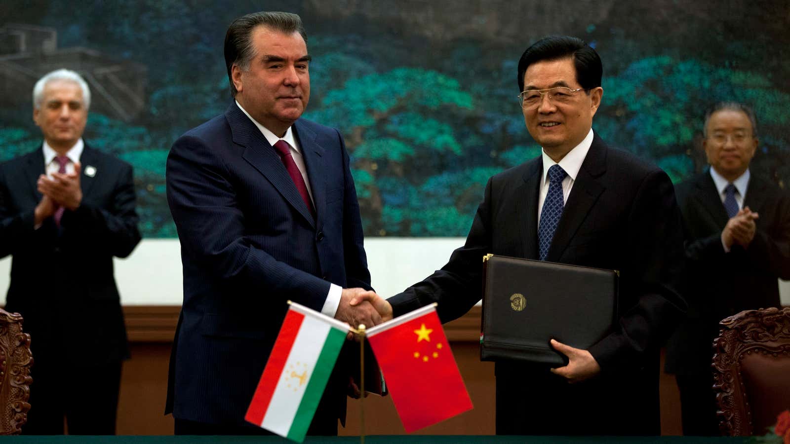 Tajikistan president Emomali Rakhmon and Chinese president Hu Jintao in June, the picture of happiness.
