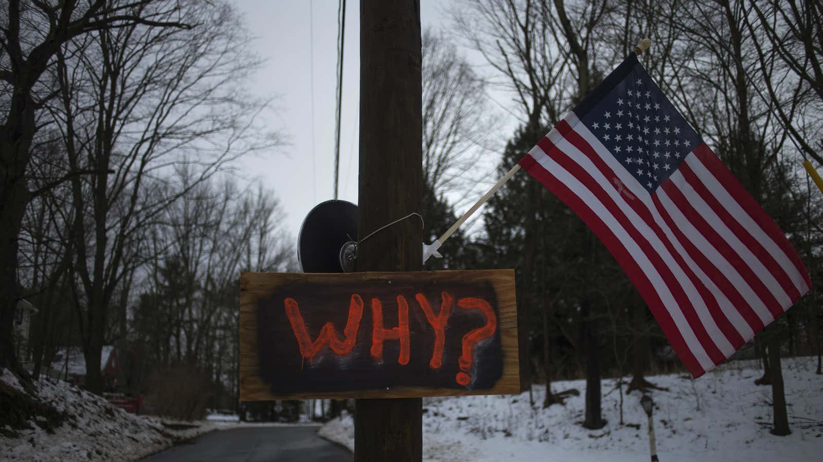 A sign posted on an electricity pole outside a house near Sandy Hook Elementary School.