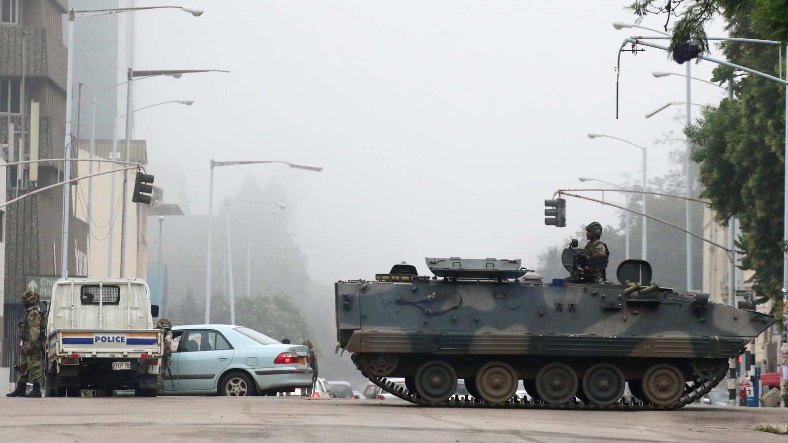Military vehicles and soldiers patrol the streets in Harare, Zimbabwe Nov. 15.