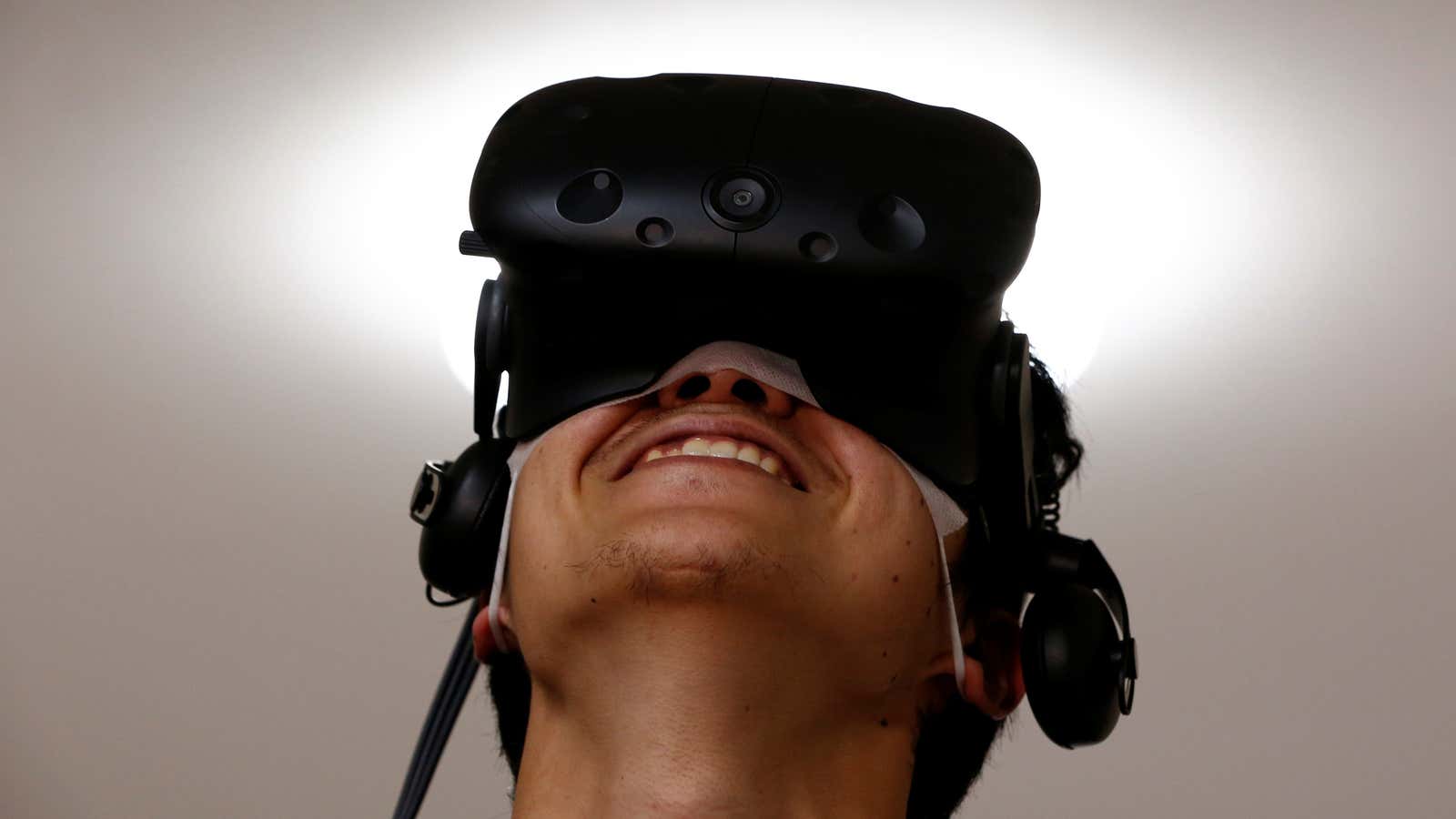 A man uses a VR headset.