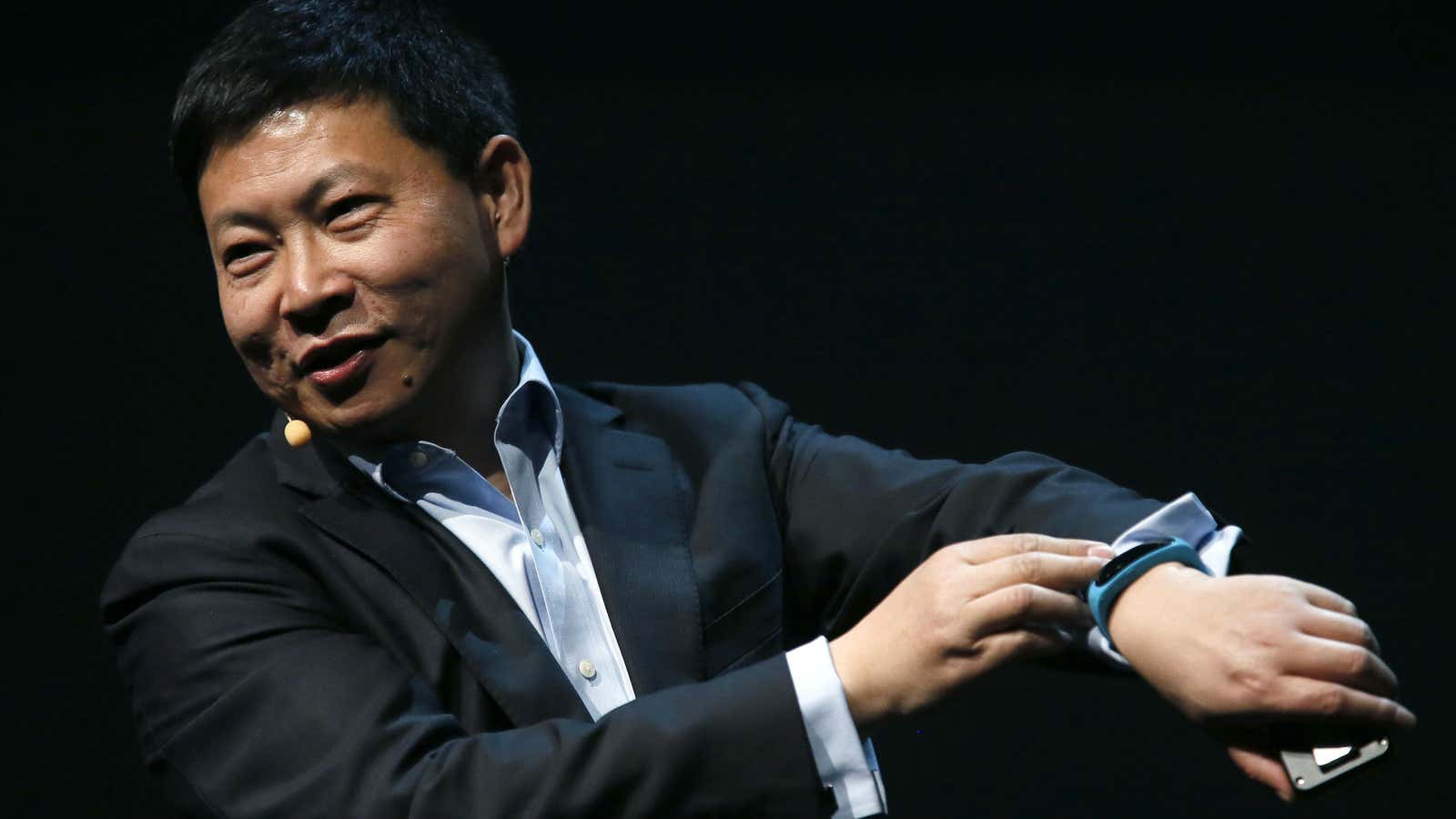 Huawei CEO Richard Yu shows off the TalkBand.