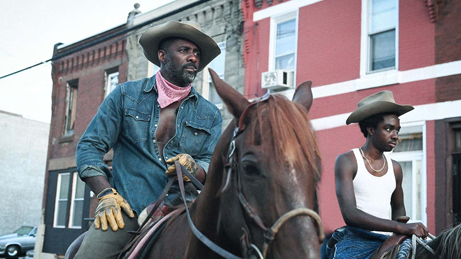 Idris Elba saddles up and Rosamund Pike works a long con in two true-ish stories out of TIFF