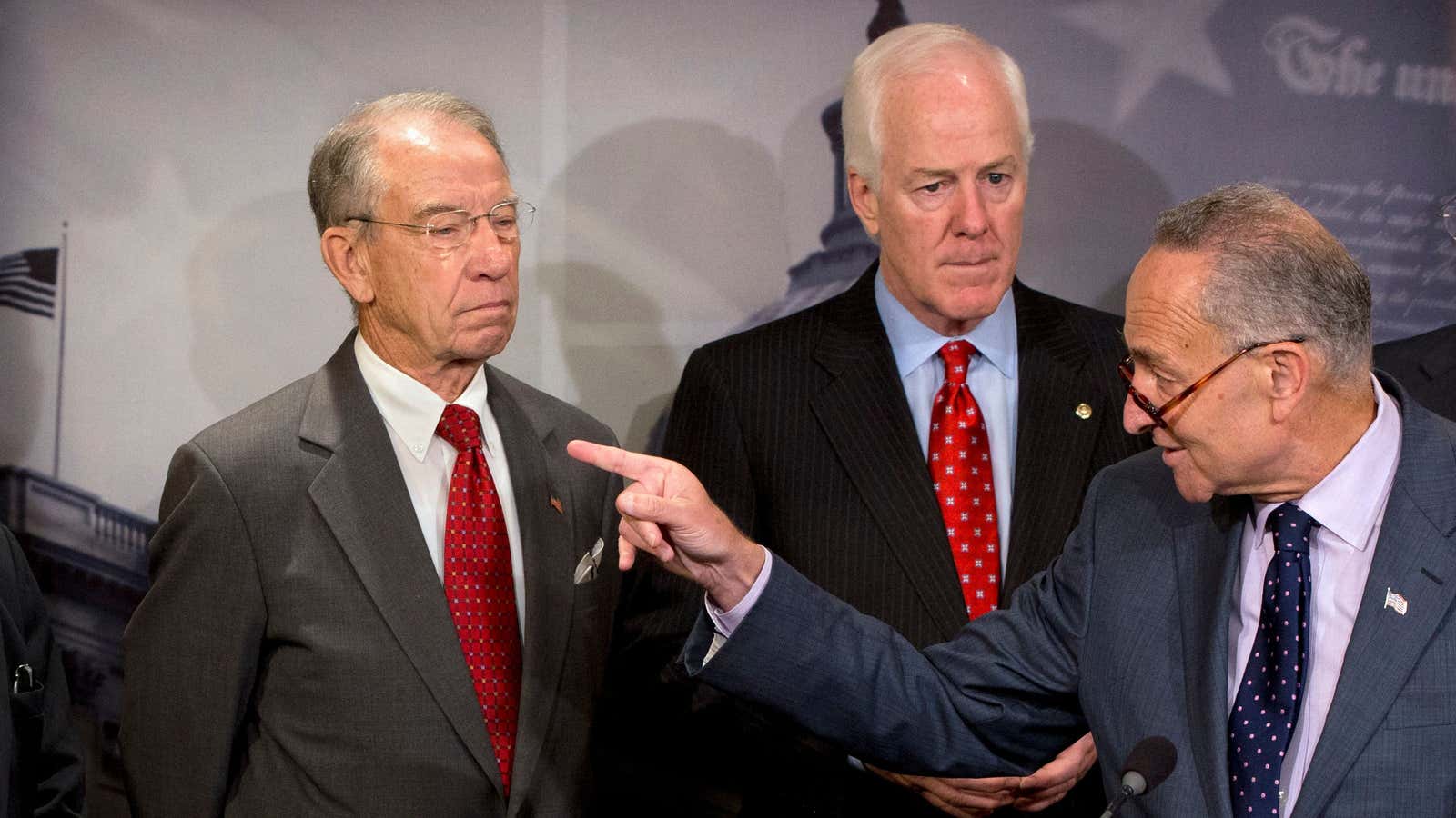Senators Schumer (right) and Grassley (left) are behind the IRS private debt collection scheme