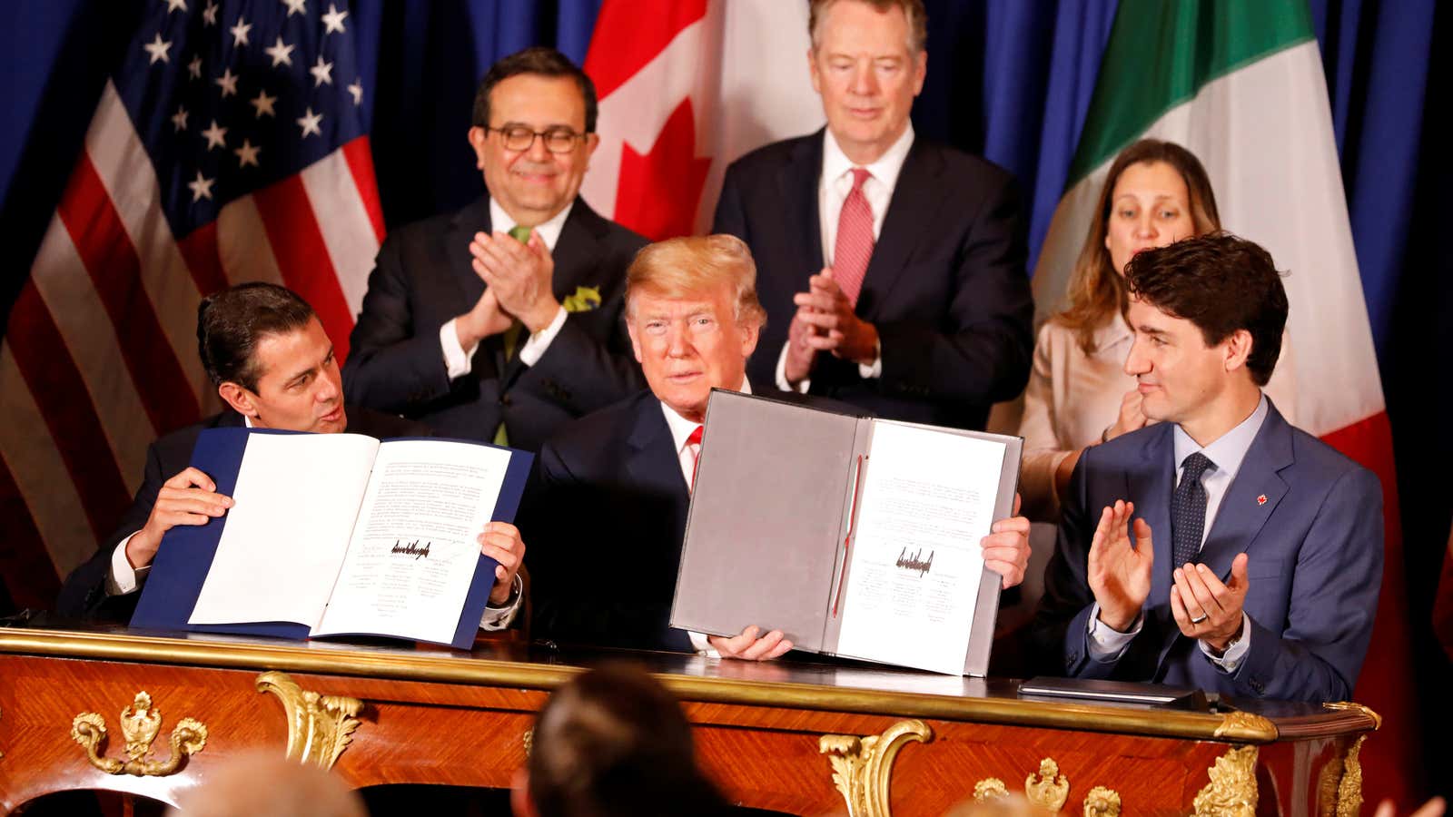 US President Donald Trump, Mexico’s President Enrique Pena Nieto and Canada’s Prime Minister Justin Trudeau attend the USMCA signing ceremony before the G20 leaders summit in Buenos Aires.