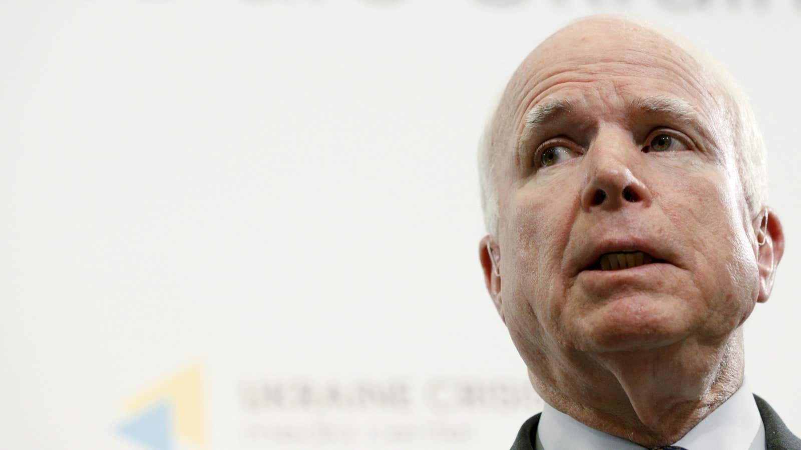 John McCain is being squeezed between the right and the left.