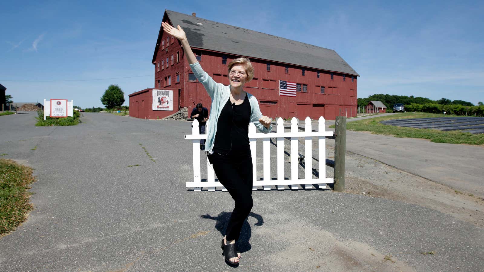Warren arrives at a farm in Massachusetts ahead of a town hall in 2018.
