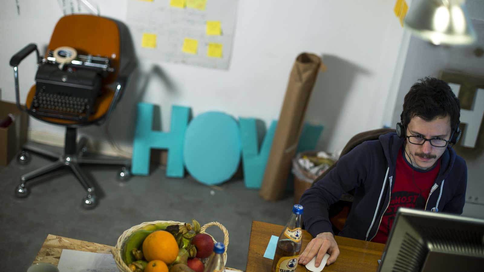 Alessandro Contini of Italy works in the office of the HowDo, a “how-to-do-it-yourself” app,start-up company at the Wostel co-working space in Berlin March 18, 2013.…