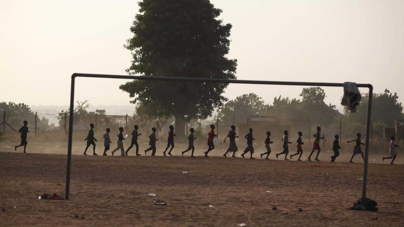 Internally displaced children training on a soccer pitch. (AP Photo/Sunday Alamba )