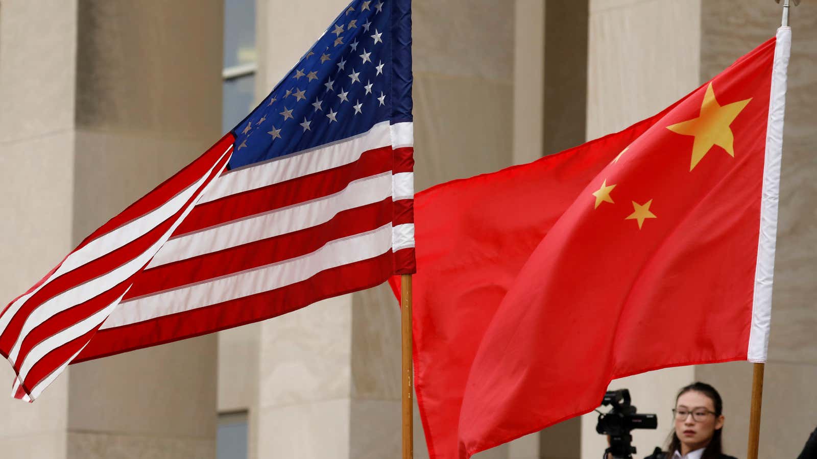 U.S. and Chinese flags are seen before Defense Secretary James Mattis welcomes Chinese Minister of National Defense Gen. Wei Fenghe to the Pentagon in Arlington,…