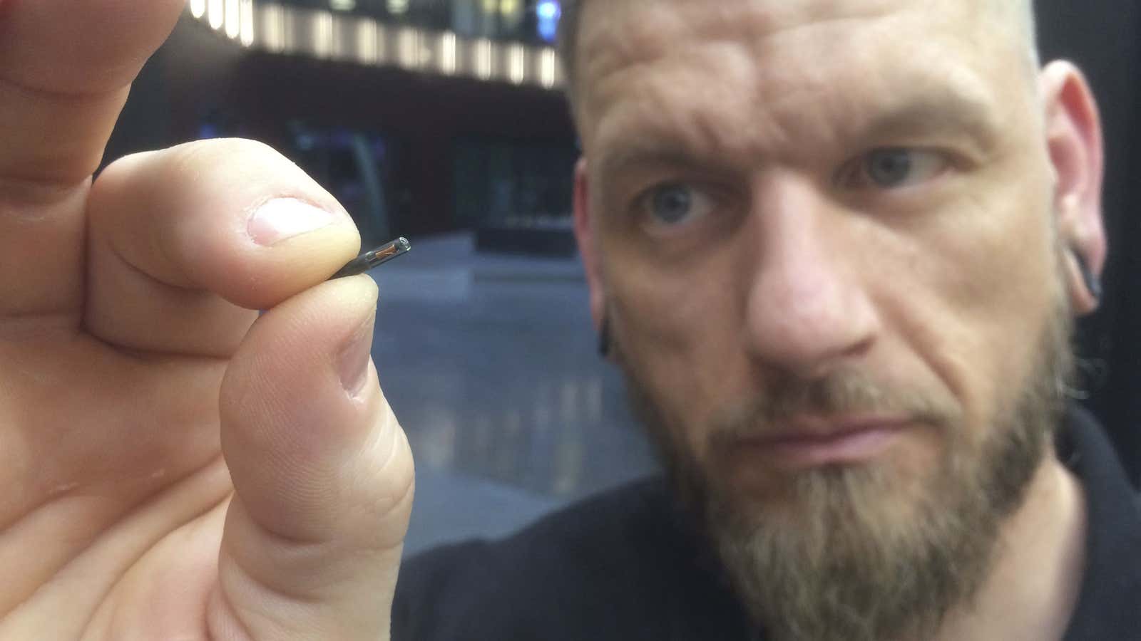 The type of microchip that employees at a Wisconsin company will embed in their fingers is about as big as a grain of rice.