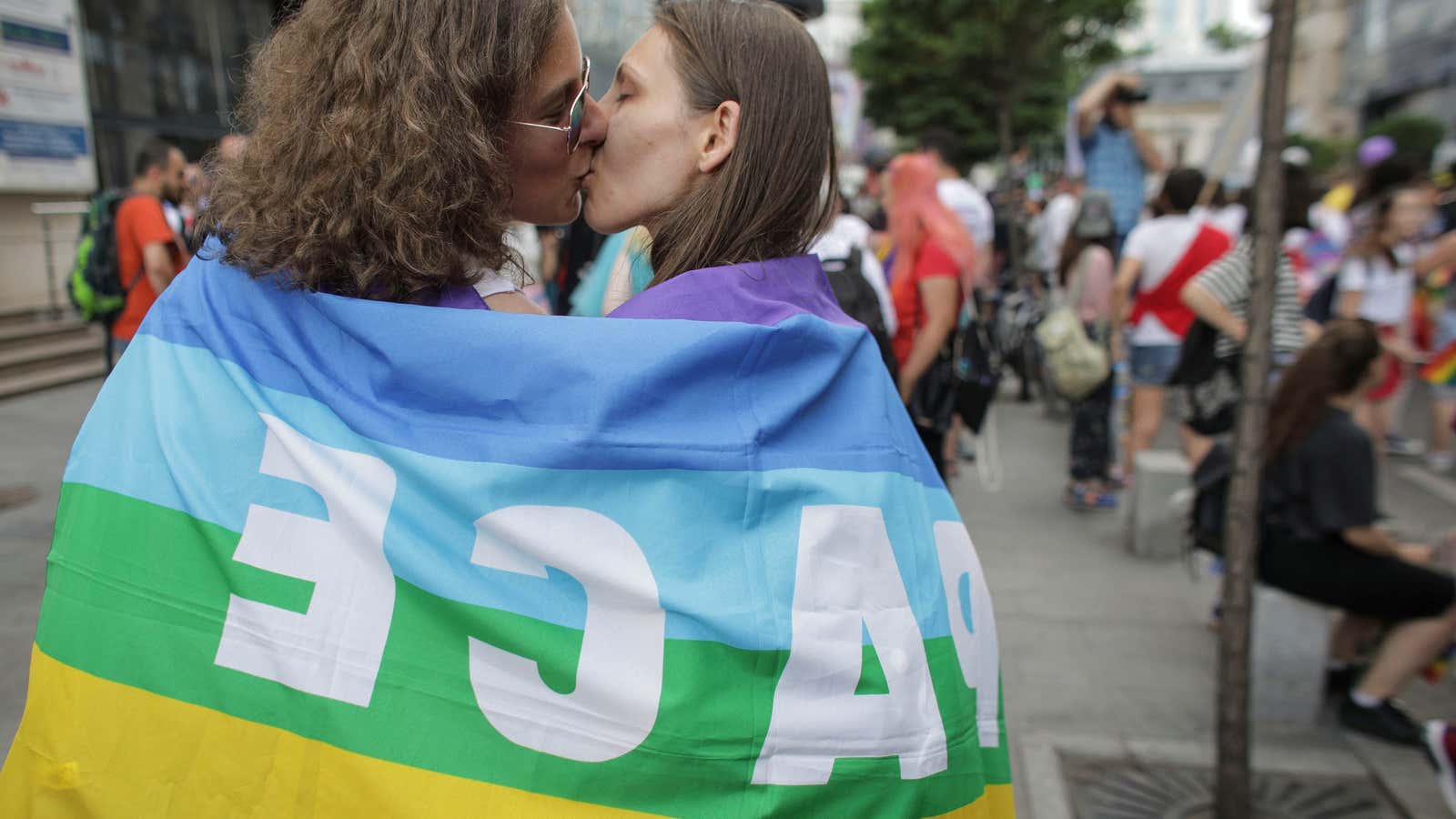 A couple kisses at a Pride march in Romania, where gay marriage is illegal.