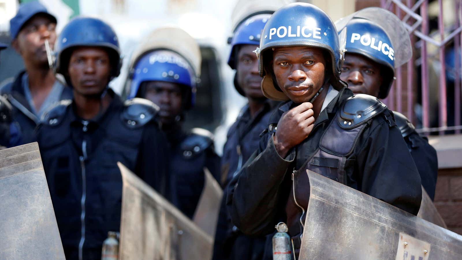 Zimbabwe police watching anti-government protesters in 2018