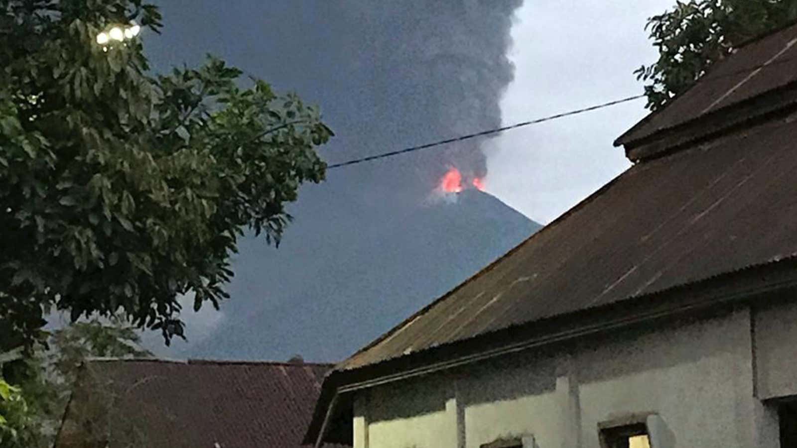 A volcano is erupting on the same island recovering from an earthquake and a tsunami