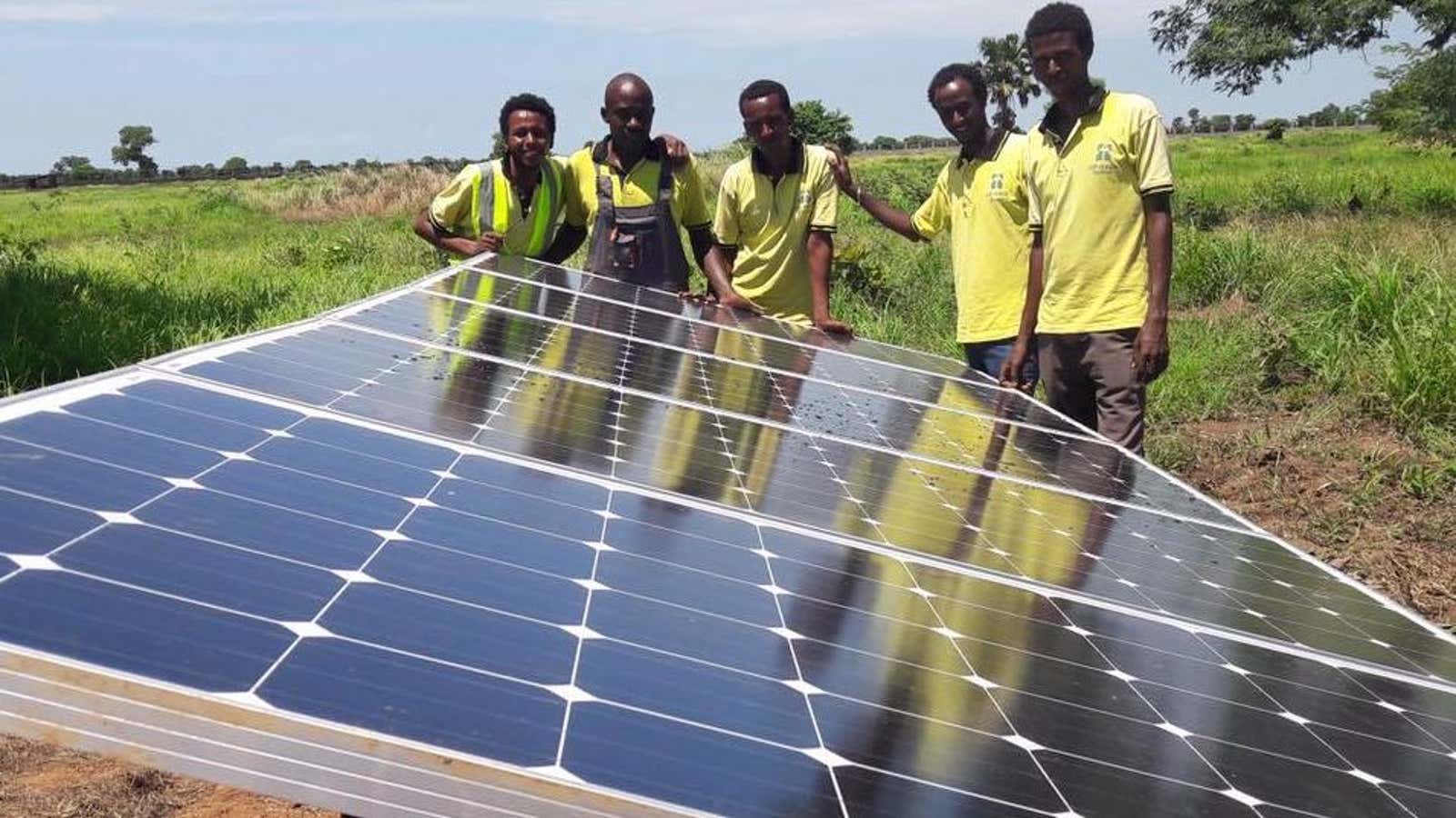 Aptech Africa technicians after installing a solar energy system for a client in South Sudan.