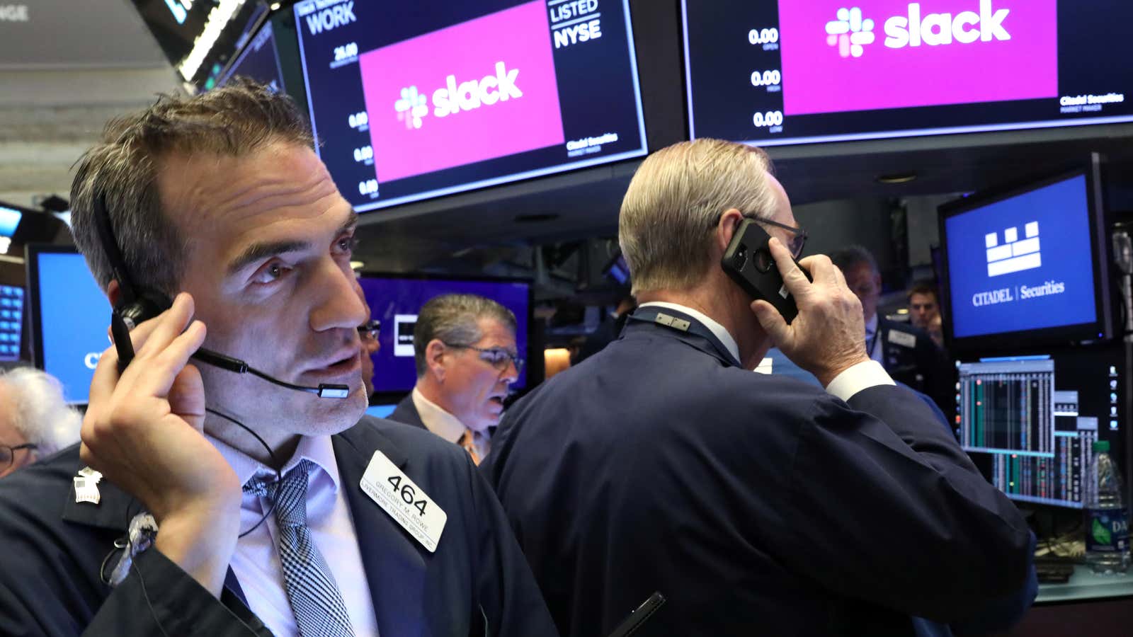 REFILE – CORRECTING INFORMATION AND SLUG Traders work on the floor at the New York Stock Exchange (NYSE) during the Slack Technologies Inc. direct listing in New York, U.S. June 20, 2019.  REUTERS/Brendan McDermid