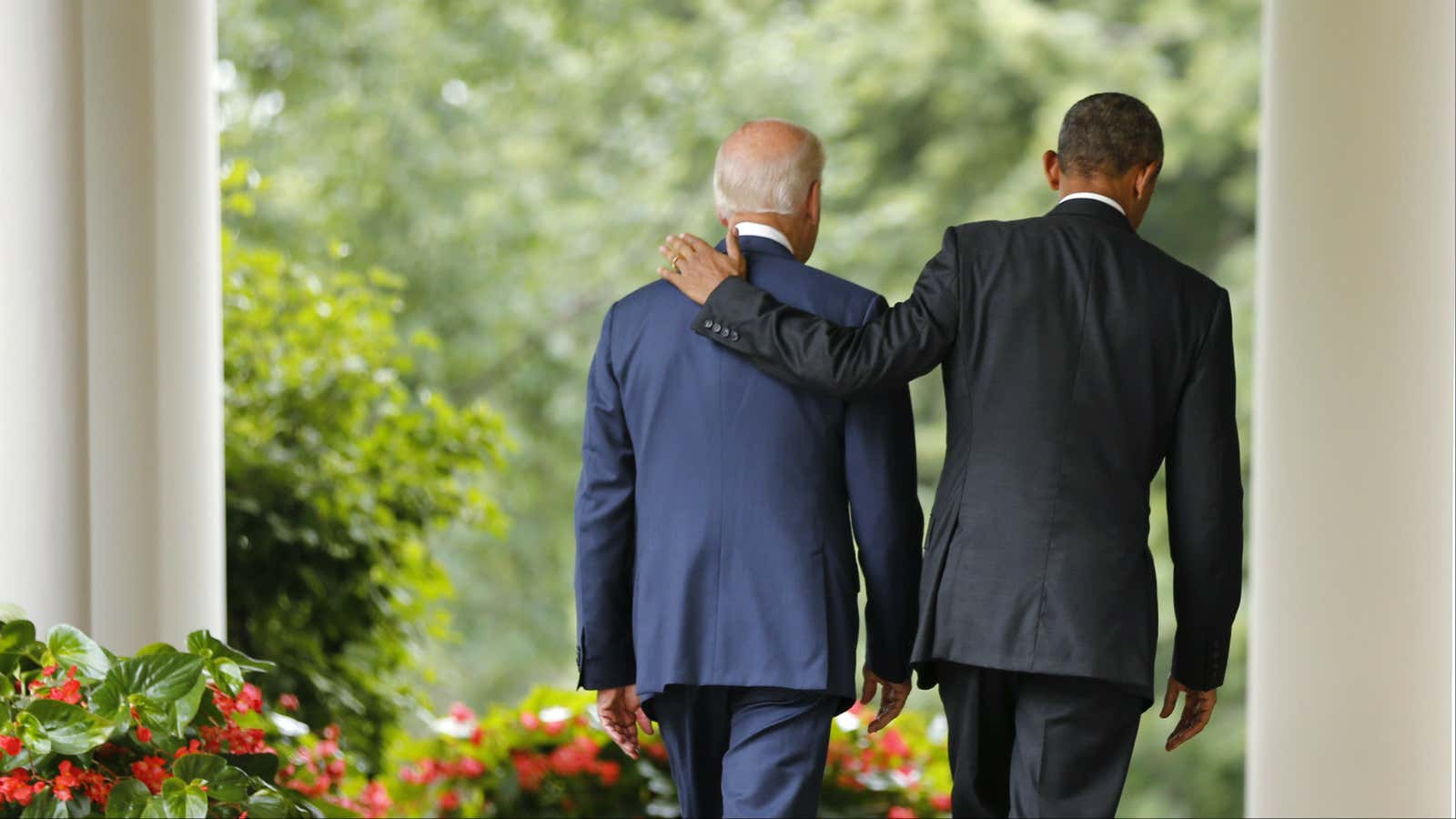 U.S. President Barack Obama (R) and Vice President Joe Biden walk back to the Oval Office after speaking about the Supreme Court ruling to uphold…