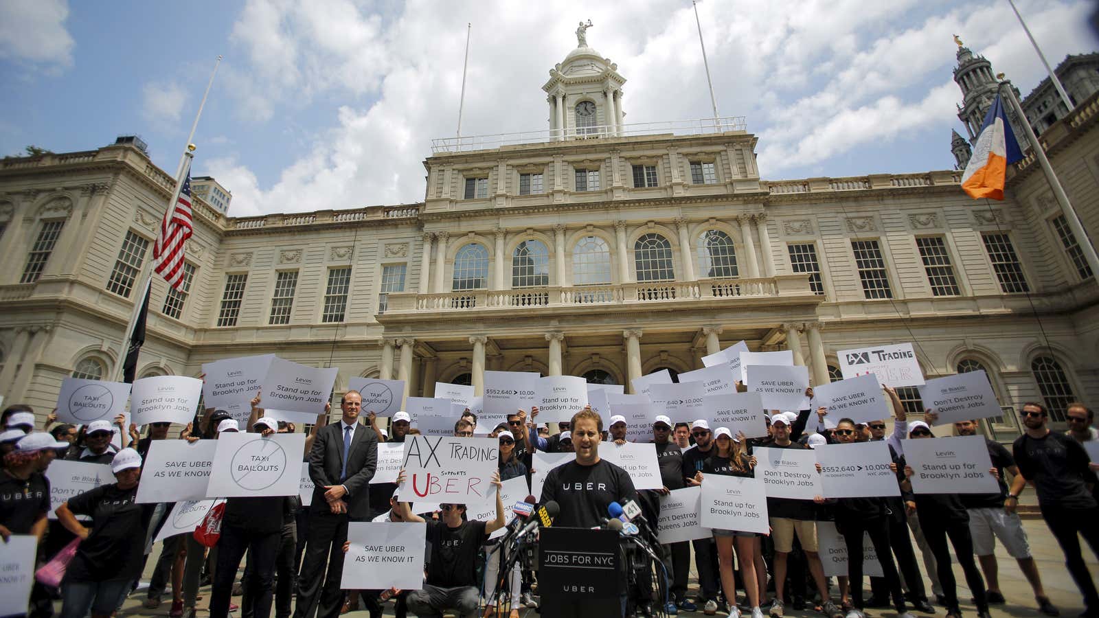 Josh Mohrer, Uber’s general manager for New York, leads a rally on the steps of City Hall in July.