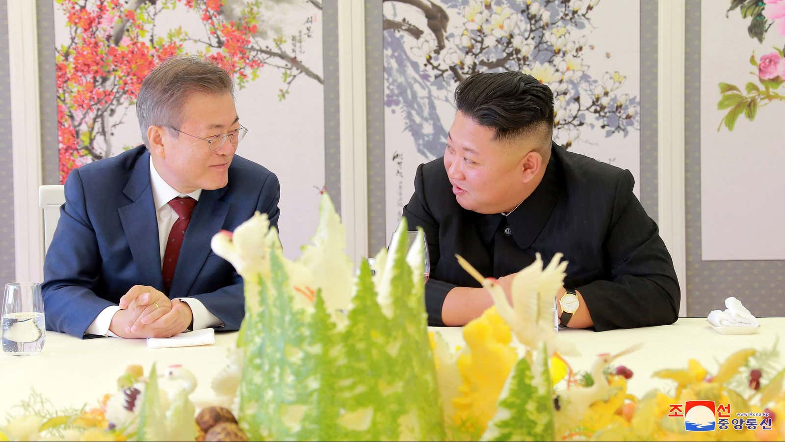 South Korean President Moon Jae-in speaks to North Korean leader Kim Jong Un during a luncheon, in this photo released by North Korea’s Korean Central…
