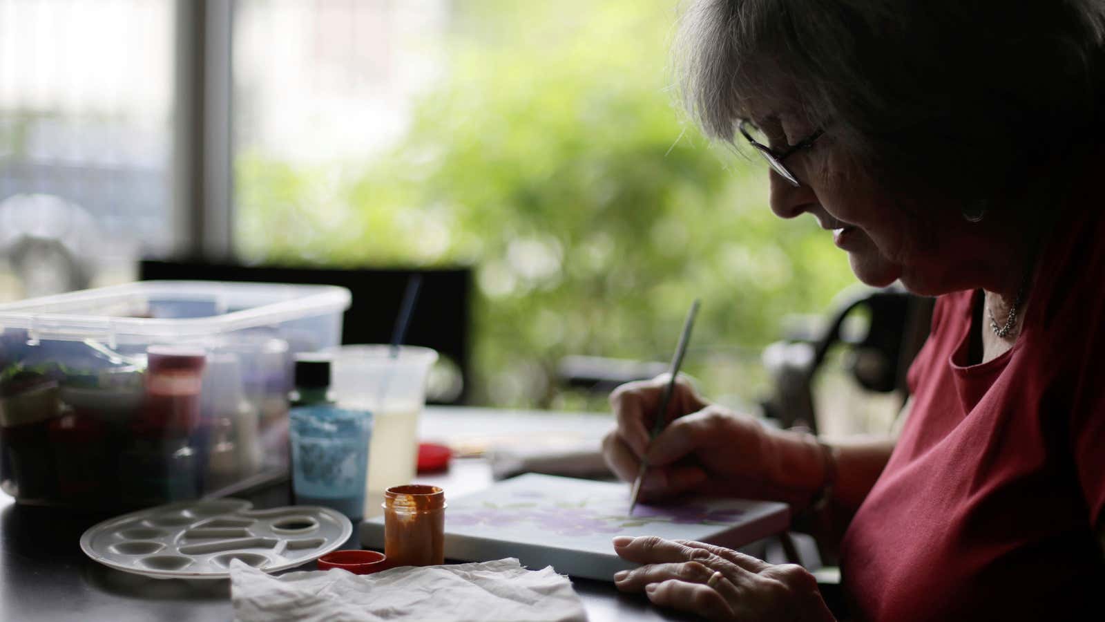 An elderly woman takes part in a painting class in the Verdeza building complex for seniors, in San Jose, Costa Rica October 15, 2018. REUTERS/Juan…
