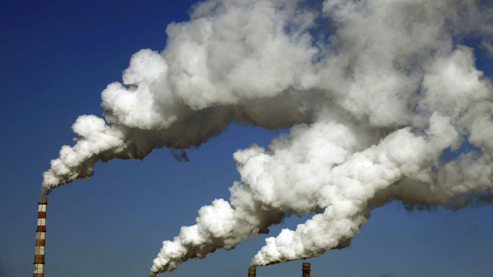 Smoke from the chimneys of a heating plant in Jilin, Jilin province January 8, 2014.