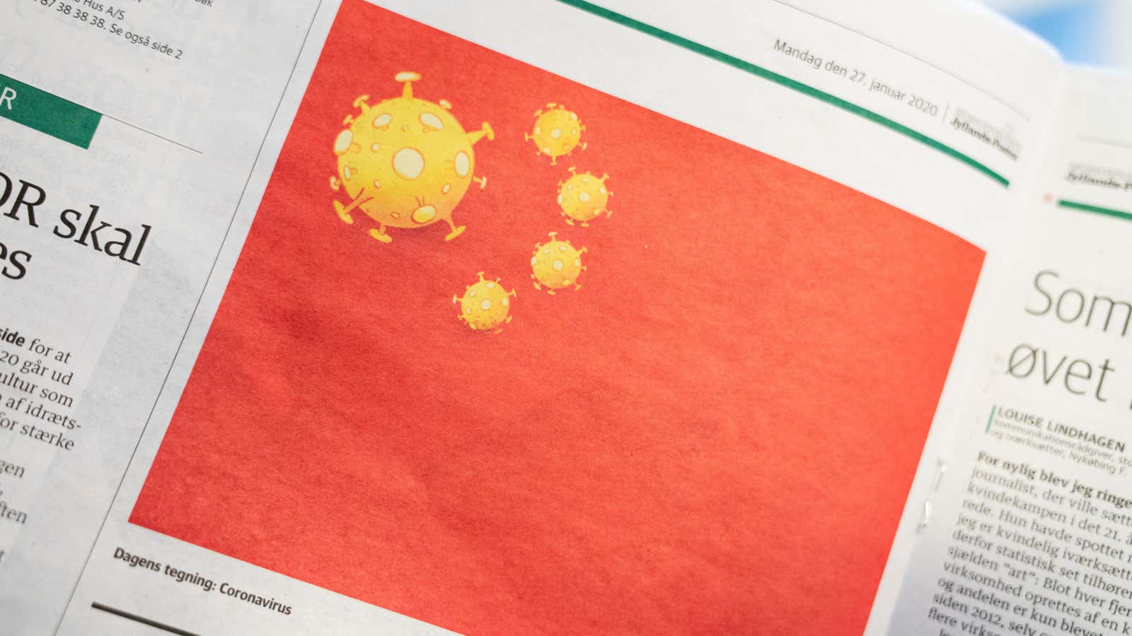 A cartoon of the coronavirus depicted as part of the Chinese national flag is pictured in a Danish newspaper. The Chinese embassy in Copenhagen said it “offends human conscience.”
