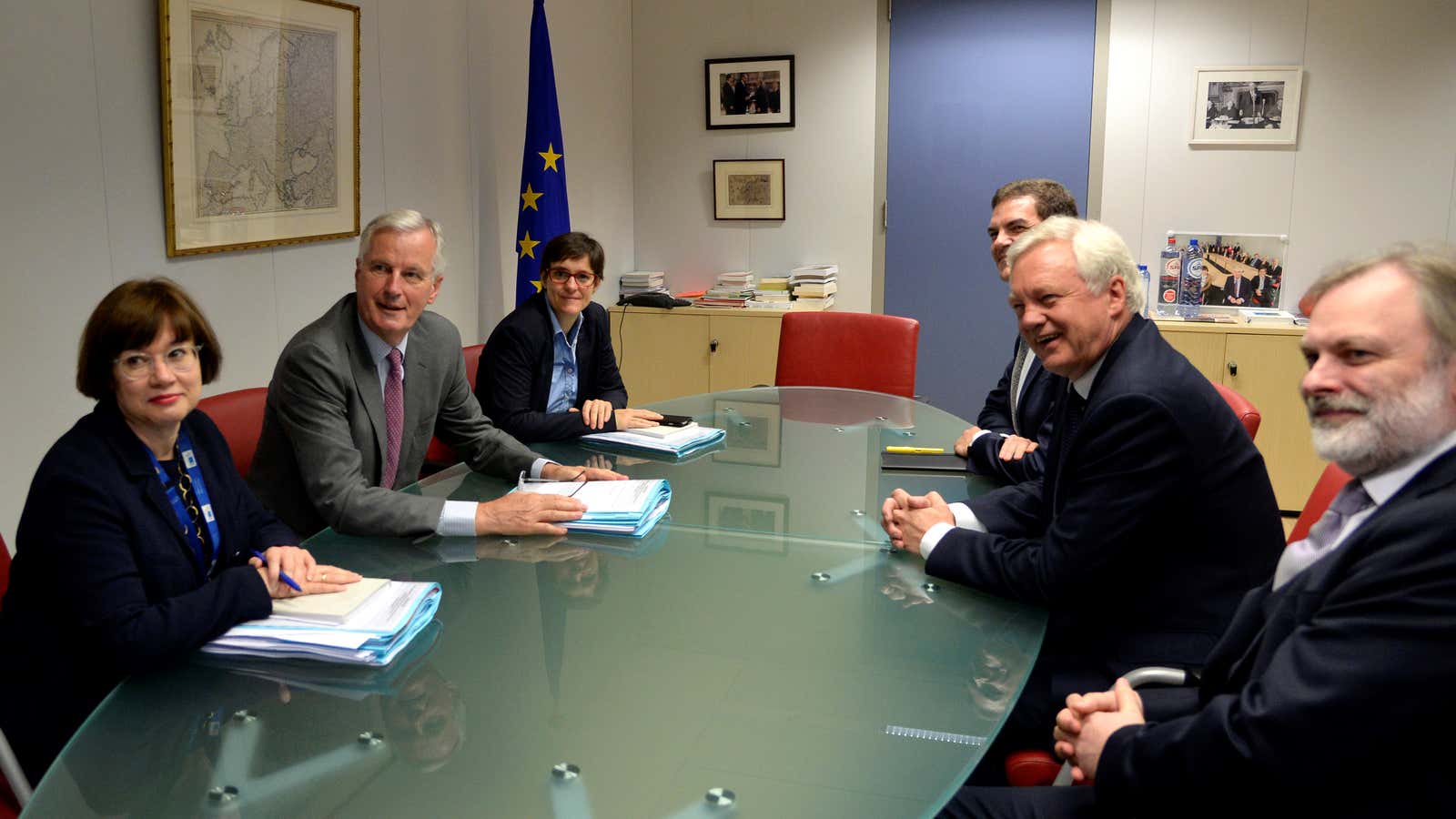 European Union’s chief Brexit negotiator Michel Barnier and his delegation and Britain’s Secretary of State for Exiting the European Union David Davis and his delegation attend a first full round of talks on July 17, 2017.