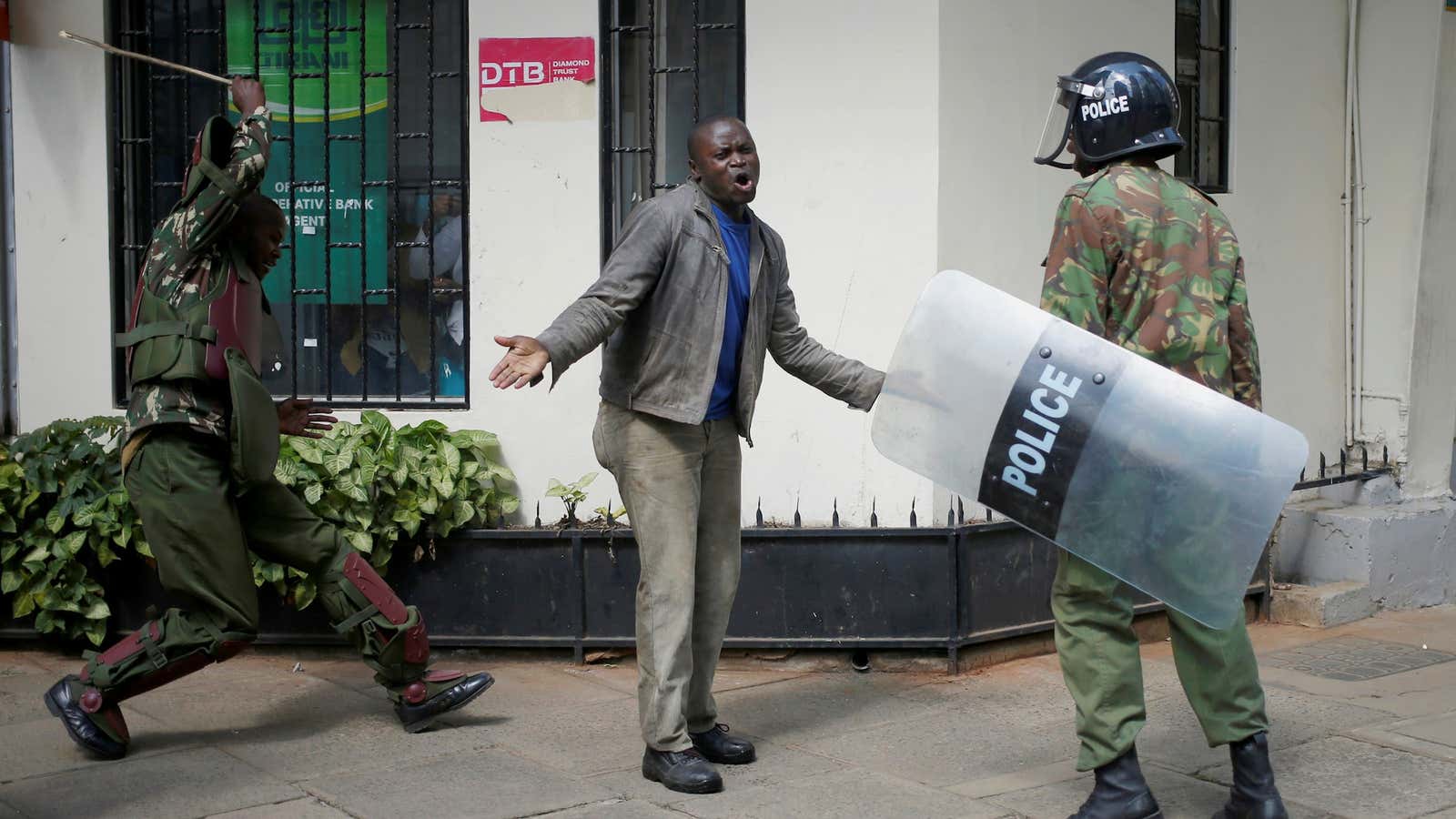 A protester speaks to a policeman during demonstrations that turned violent in May.