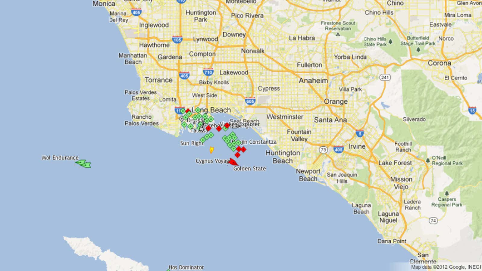 Container ships (green) idle around the twin ports of Los Angeles and Long Beach December 4, approx. 7am Pacific Time