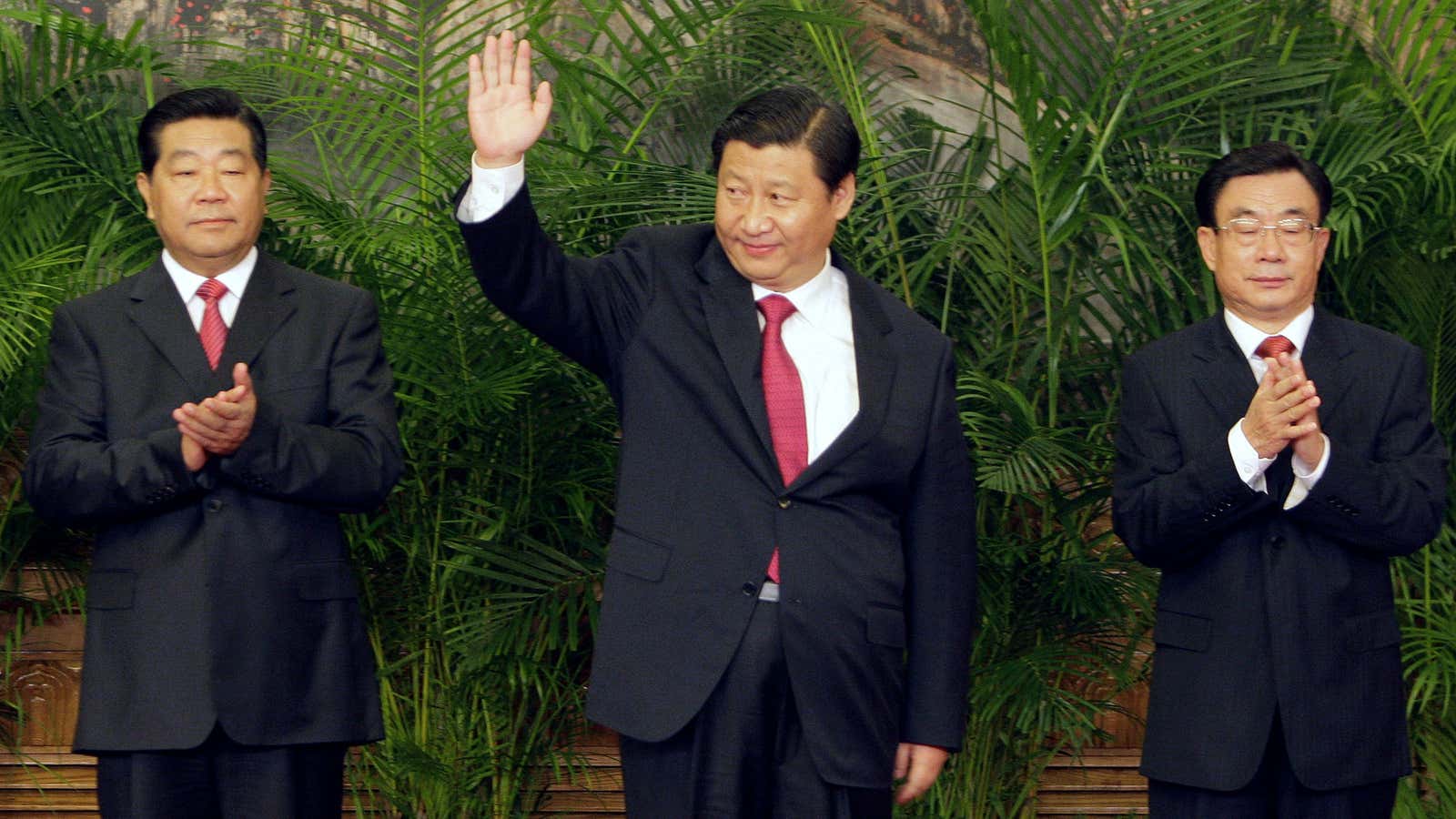 Xi Jinping and Jia Qinglin (L) as new members of Politburo Standing Committee in 2007.