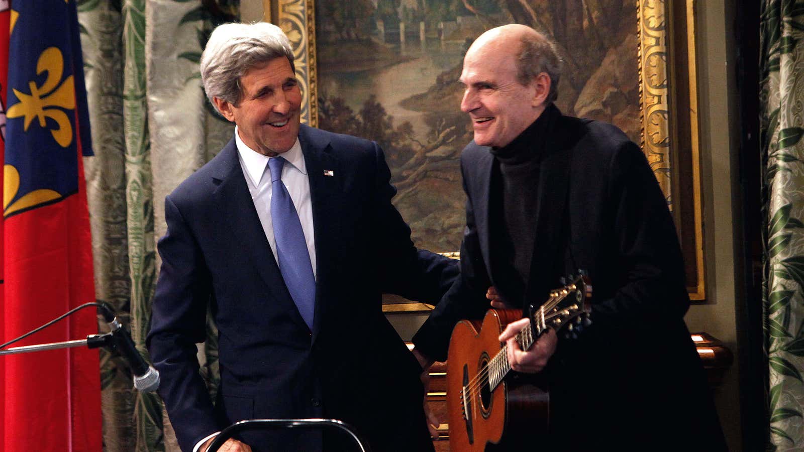 Kerry and Taylor play guitar diplomacy.