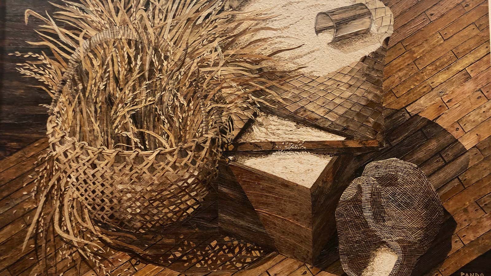 An ingenious Filipino artist creates mosaics with dead leaves and garlic peels