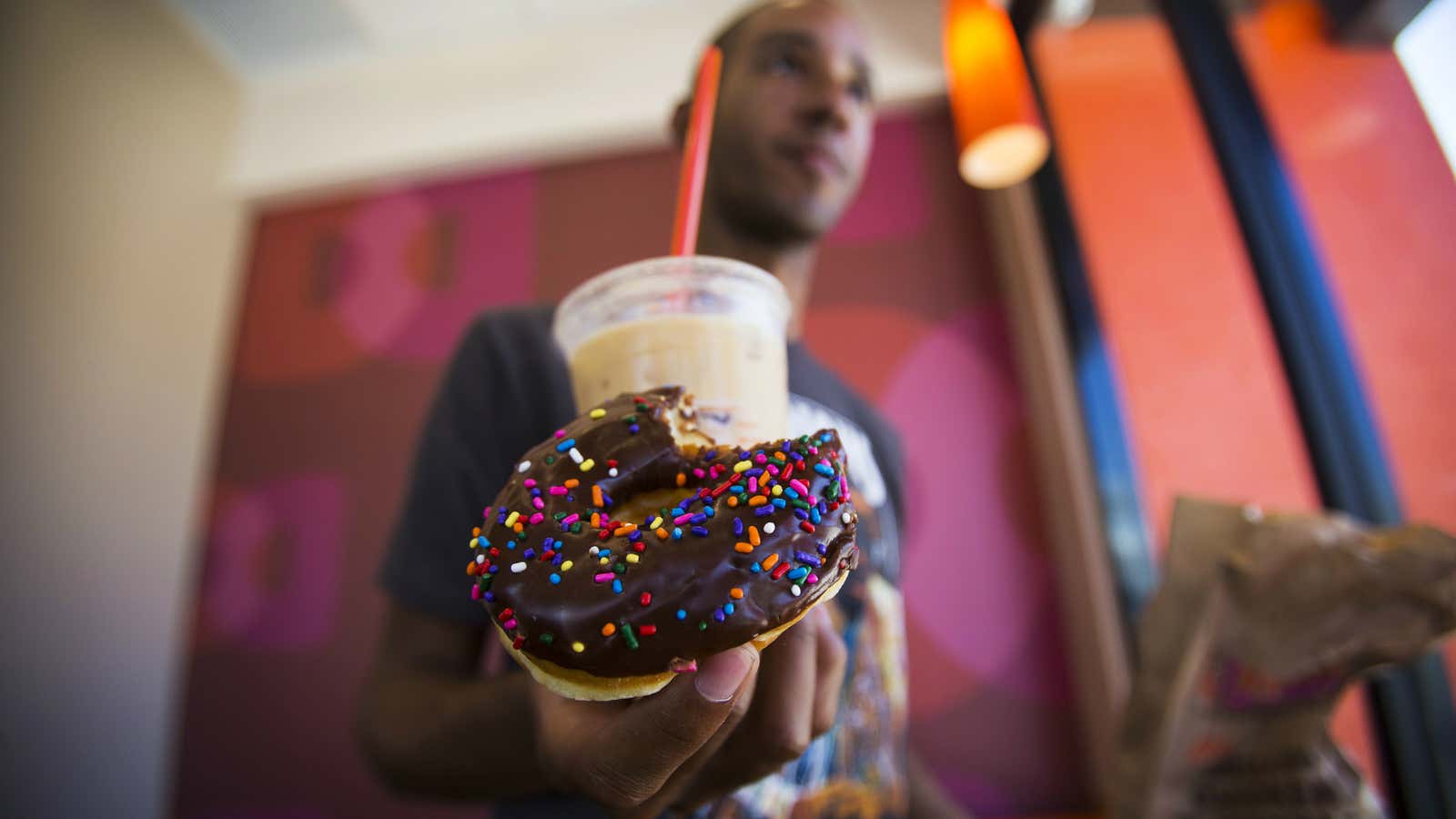 Dunkin’ Donuts is banking on curbside delivery to help boost business against its rivals.