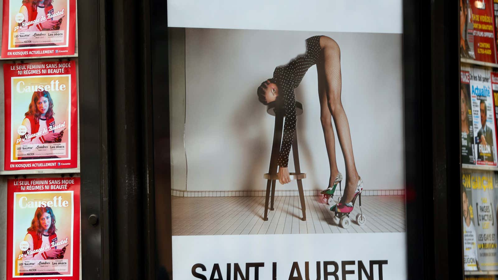 An ad by Saint Laurent at a newspaper kiosk in Paris.