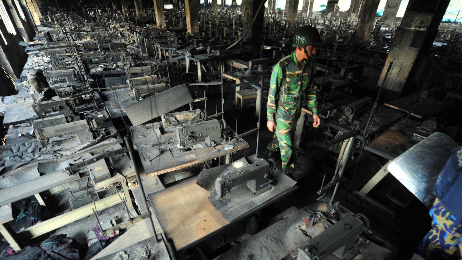 Rows of sewing machines in the Bangladeshi garment factory where more than 100 workers died in a fire