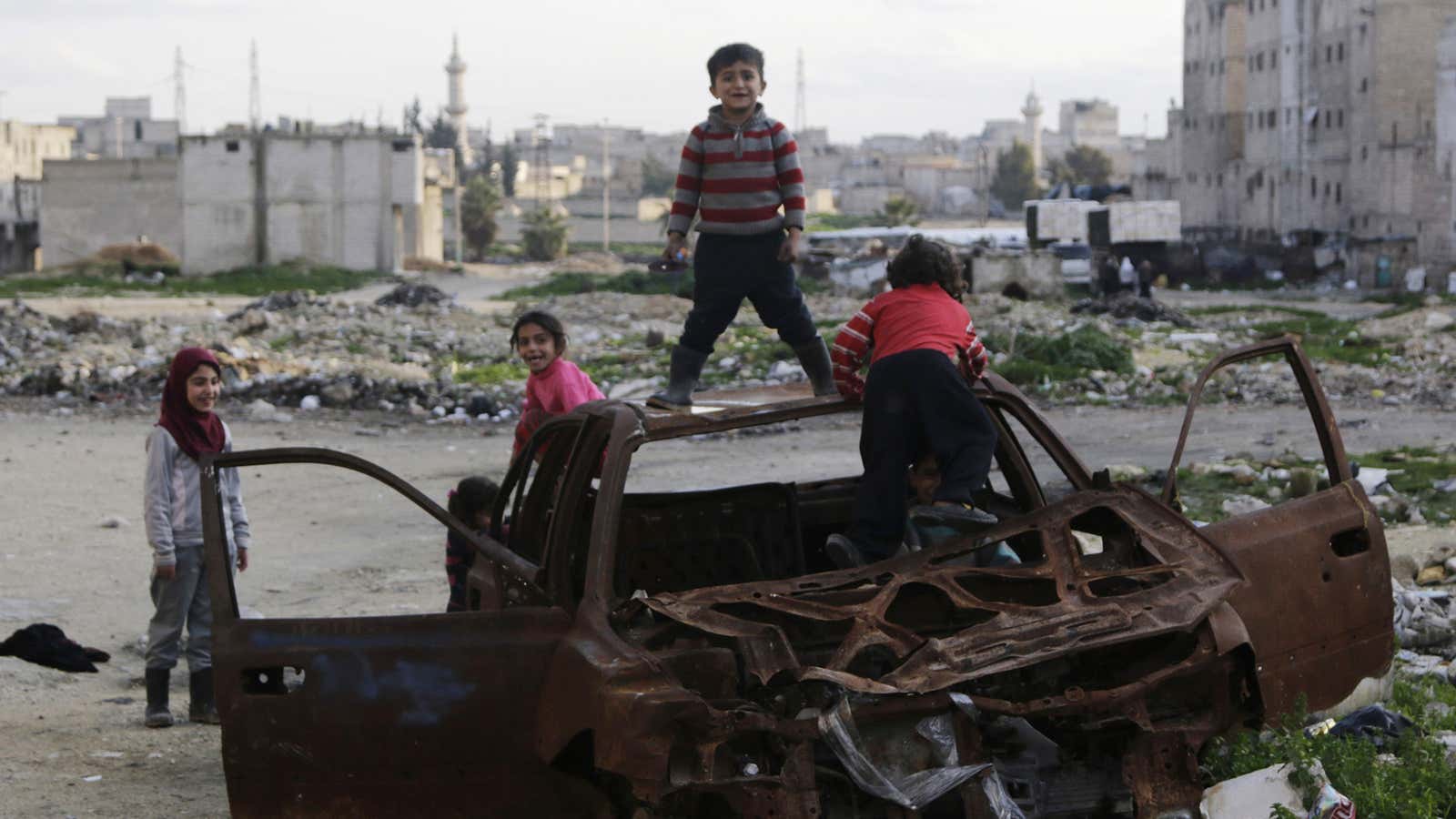 Children in Aleppo, where school enrollment is at 6%.         .