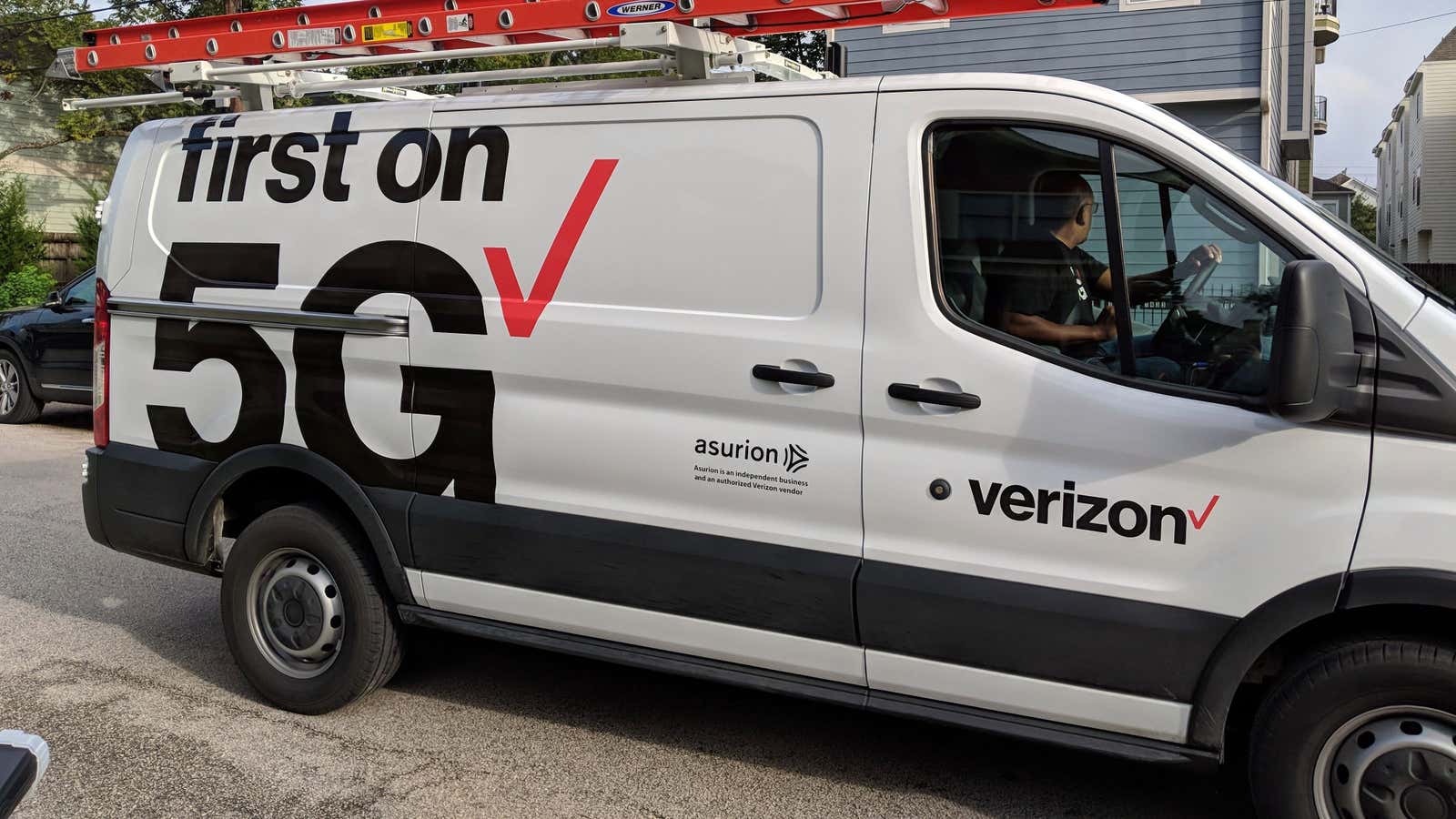 A Verizon truck on its way to install 5G broadband. Its 5G cell network will be rolled out next year.