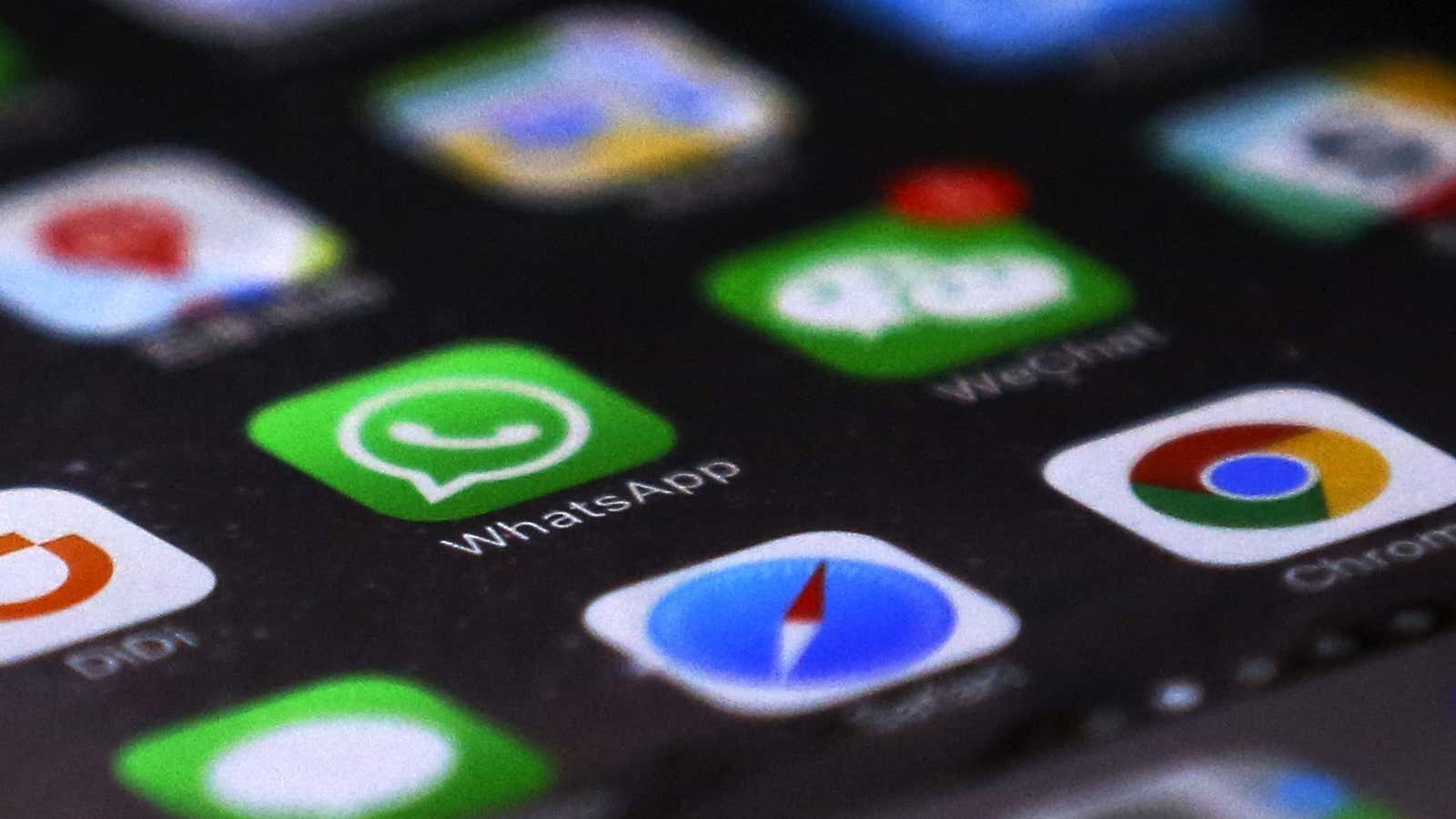 WhatsApp is seen with other mobile apps on a smartphone in Beijing, Tuesday, July 18, 2017. Users of WhatsApp in China and security researchers reported…