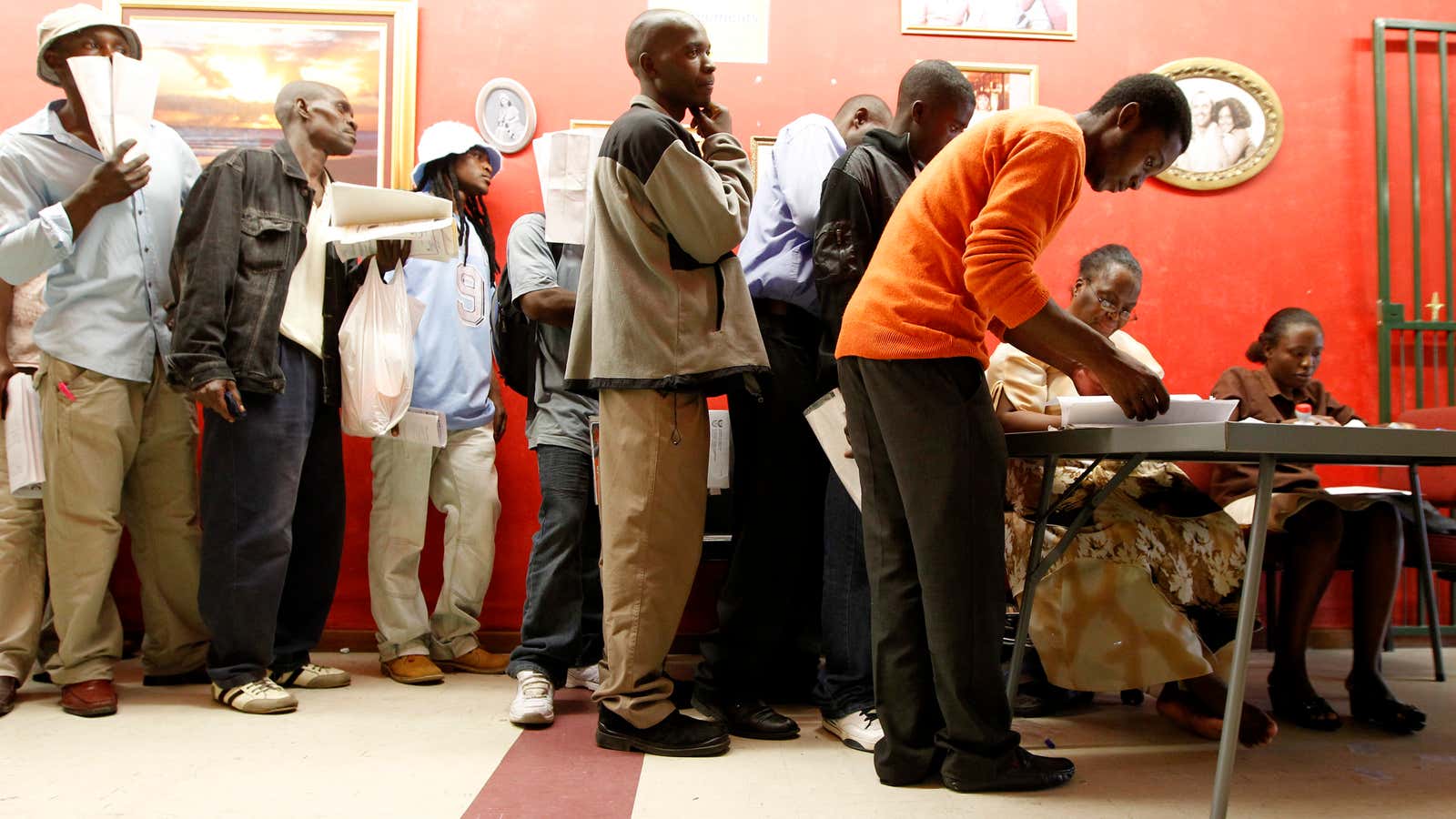 Zimbabweans queue to apply for residence permits in Cape Town.