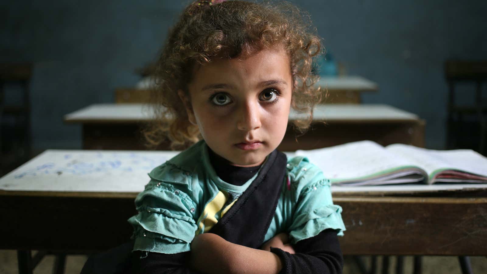 A 2014 photo of a Syrian refugee girl in a classroom at a north Lebanon public school