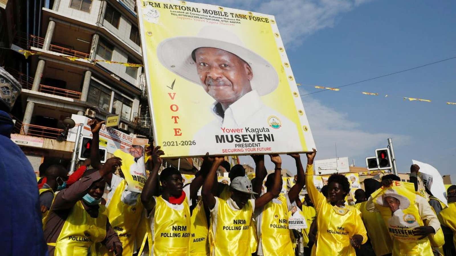 Polling agents from the National Resistance Movement (NRM) party celebrate the victory of Uganda’s president Yoweri Museveni in Kampala, Uganda Jan.16, 2021.
