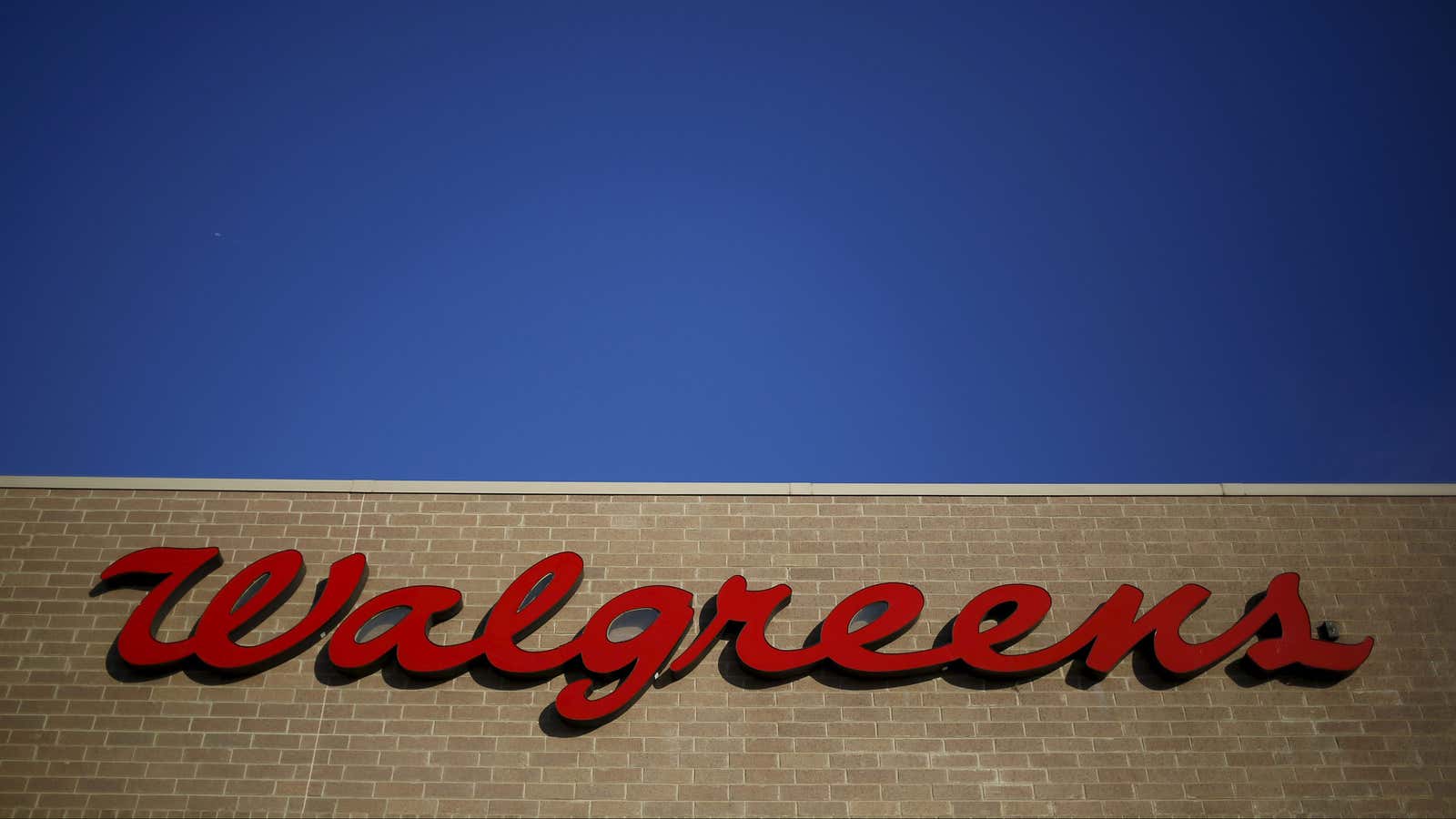 A Walgreens sign is seen in the Chicago suburb of Niles, Illinois in this February 10, 2015 file photo. Files GLOBAL BUSINESS WEEK AHEAD PACKAGE-…