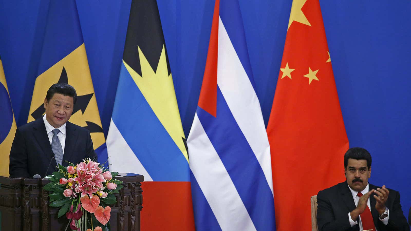 Venezuelan president Nicolas Maduro has good reason to applaud Xi Jinping.