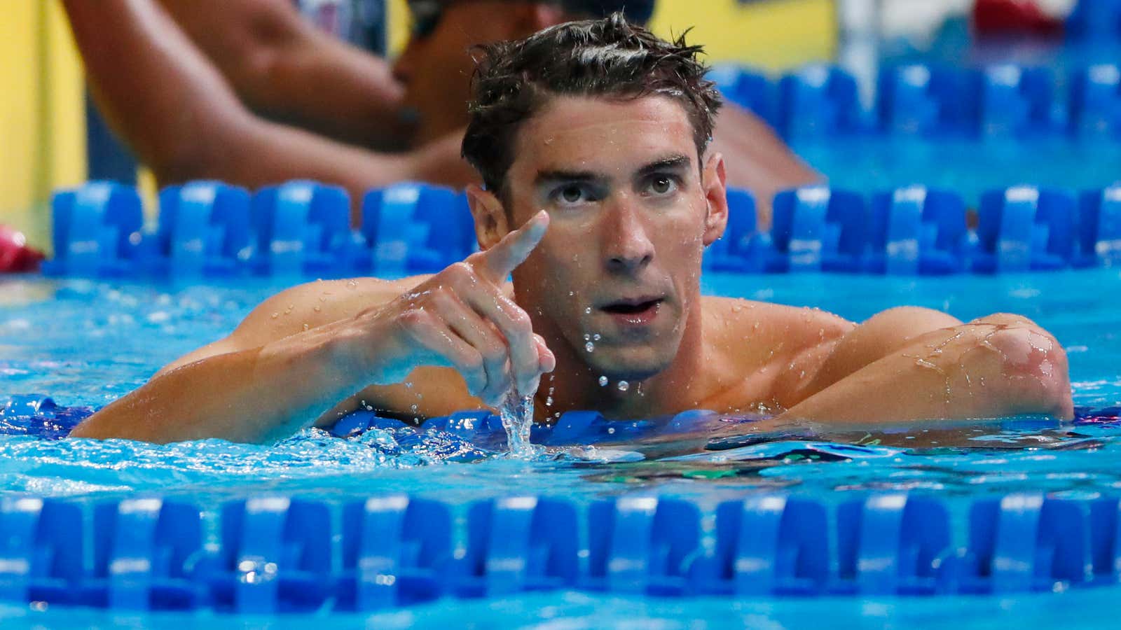 July 2, 2016; Omaha, NE, USA; Michael Phelps reacts after the men’s 100m butterfly finals in the U.S. Olympic swimming team trials at CenturyLink Center. Mandatory Credit: Erich Schlegel-USA TODAY Sports – RTX2JFWH