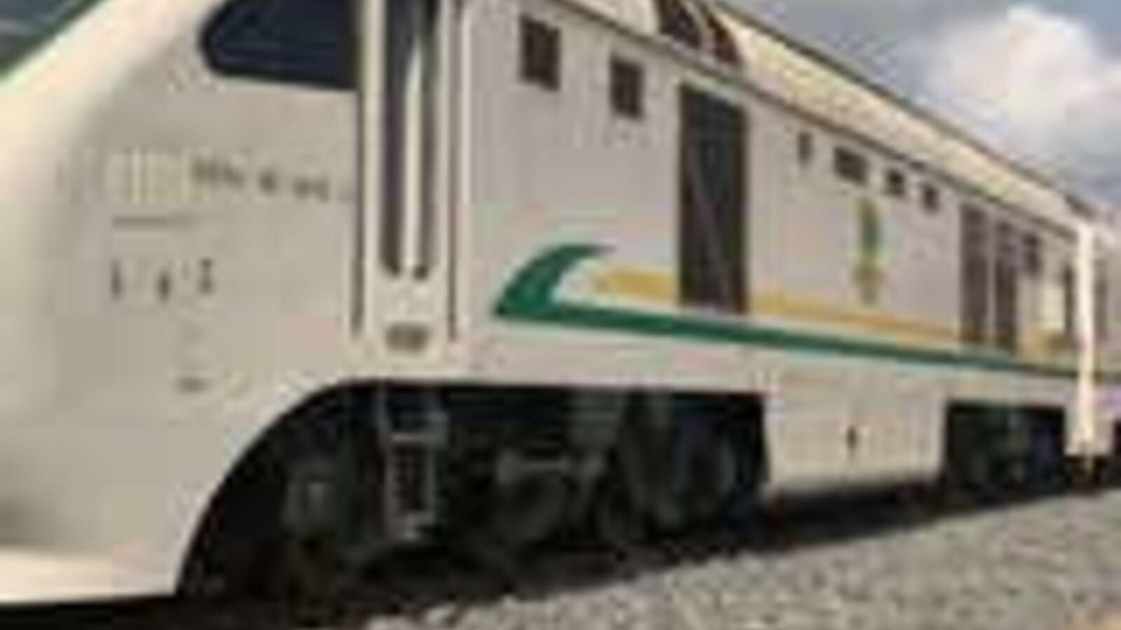 The locomotive end of the train slithers through the Lagos train station where travellers will disembark and head to their various destinations in Lagos
